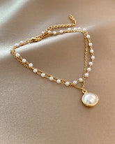 Perlenarmband mit Metallkette