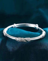 Armband mit verstellbarem Blumenmuster