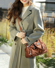 Vintage-Handtasche und Umhängetasche aus weichem Leder.