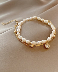 Perlenarmband mit Metallkette