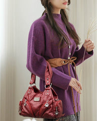 Vintage-Handtasche und Umhängetasche aus weichem Leder.