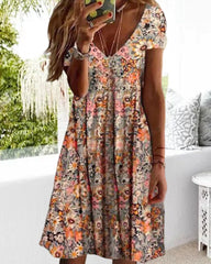 Kleider mit trendigen Prints und V-Ausschnitt 