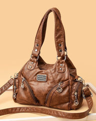 Vintage-Handtasche und Umhängetasche aus weichem Leder.