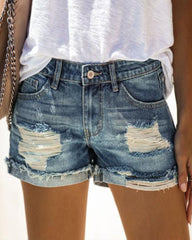 Zerrissene Jeansshorts mit mittlerer Taille